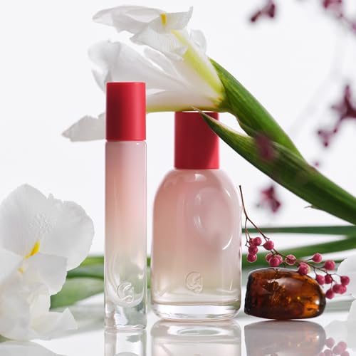 Glossier You Eau de Parfum, Unisex Skin-Scent Enhancer, Travel 8 ml | Warm, Musky & Spicy, Pink Pepper, Iris & Ambrox Base Notes, Smells Different on Everyone, Layer & Mix to Match Your Mood